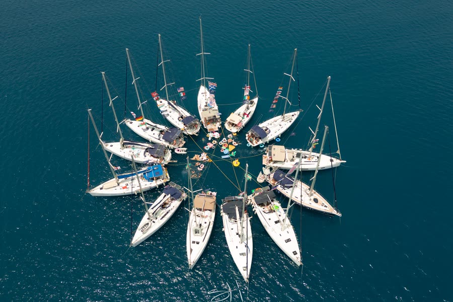 Overhead view of the fleet rafted in a circle, bows pointing inwards